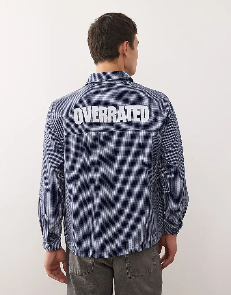 Рубашка свободного кроя Reclaimed Vintage с принтом на спине в сине-белую клетку
Рубашка свободного кроя Reclaimed Vintage с принтом на спине в сине-белую клетку