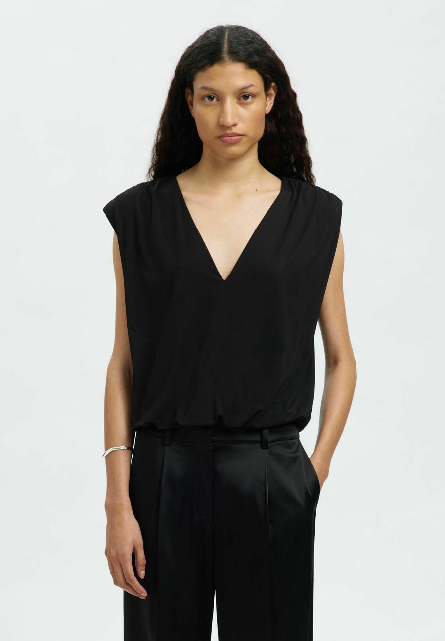 Блуза Selected MIT V-AUSSCHNITT ÄRMELLOSES, Black
Блуза Selected MIT V-AUSSCHNITT ÄRMELLOSES, Black