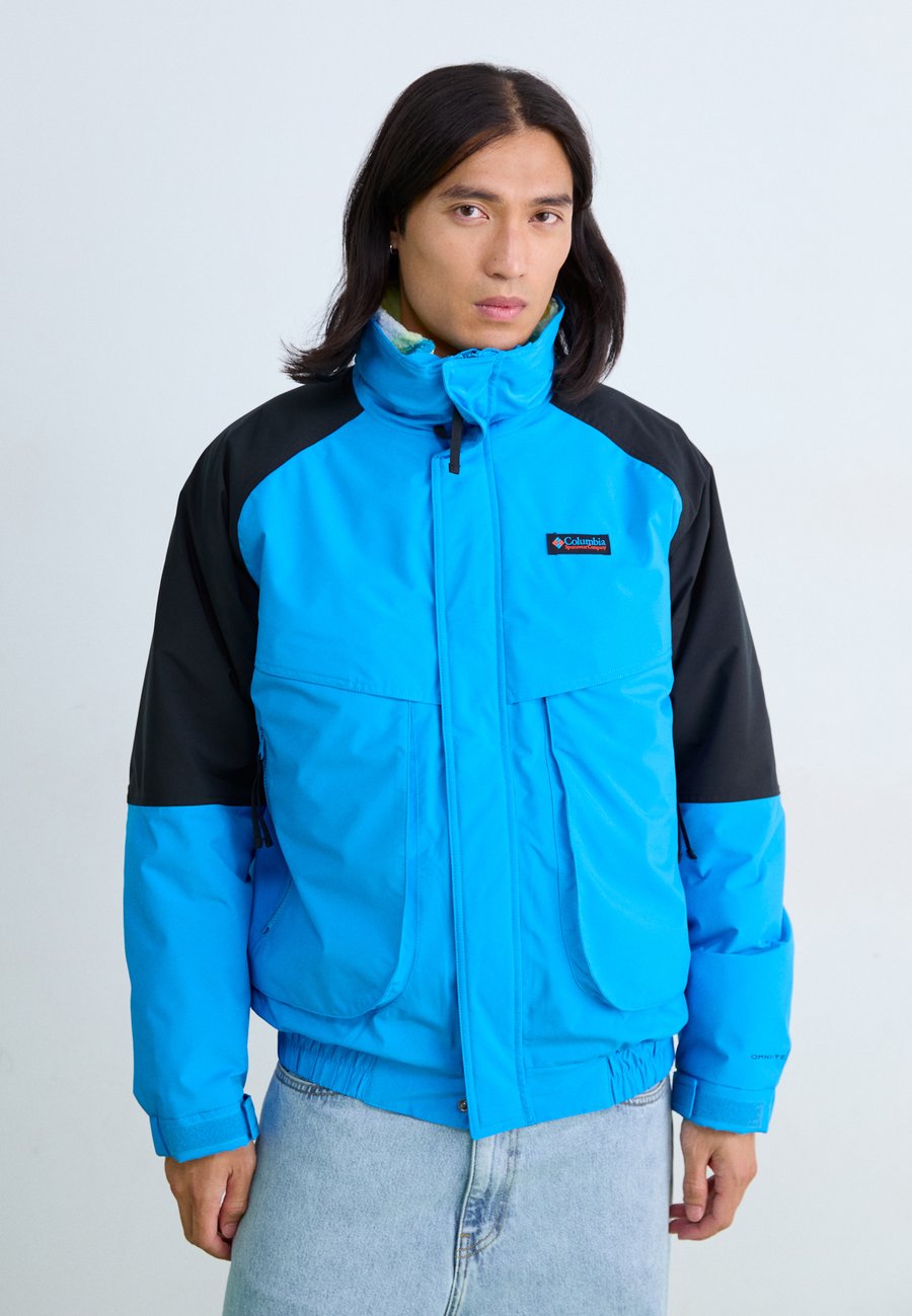 Куртка Columbia POWDERKEG II REMASTERED INTERCHANGE 2-IN-1, Compass Blue/Black/Dark Blue
Куртка Columbia POWDERKEG II REMASTERED INTERCHANGE 2-IN-1, Compass Blue/Black/Dark Blue