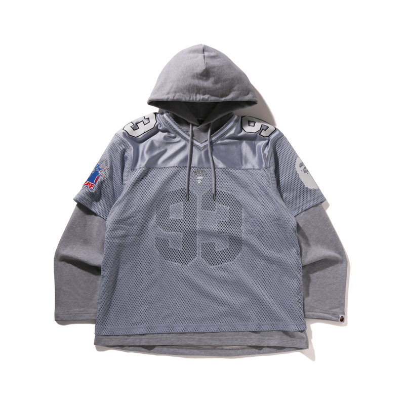 A BATHING APE Bape Multi Logo Layered Sleeves Relaxed Fit Football Jersey
A BATHING APE Bape Multi Logo Layered Sleeves Relaxed Fit Football Jersey