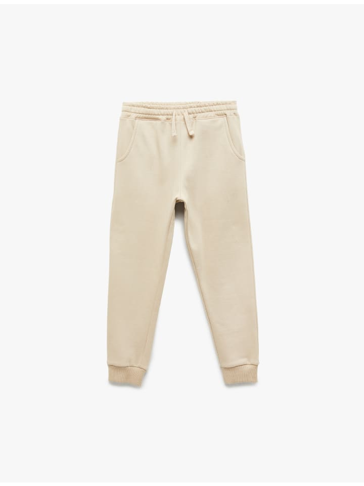 Спортивные брюки бежевого цвета KOTON
Спортивные брюки бежевого цвета KOTON