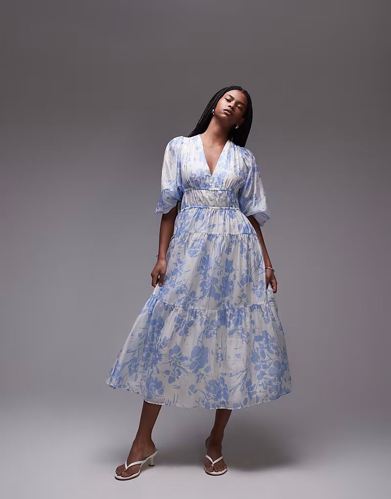 Платье мидакси & Other Stories с объемными рукавами и сборчатым лифом с синим цветочным принтом
Платье мидакси & Other Stories с объемными рукавами и сборчатым лифом с синим цветочным принтом