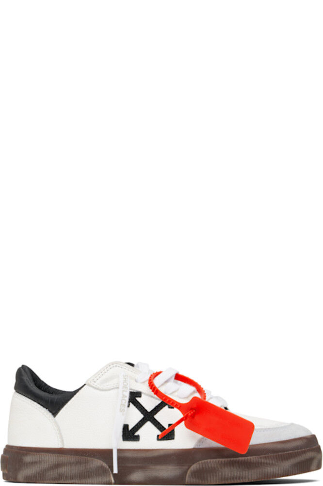 Новые низкие кроссовки из вулканизированной кожи белого и черного цвета Off-White
Новые низкие кроссовки из вулканизированной кожи белого и черного цвета Off-White