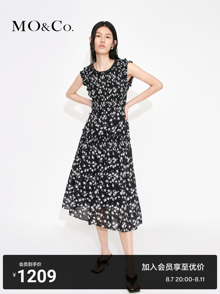 Платье Moco с рюшами и цветочным принтом без рукавов, черный
Платье Moco с рюшами и цветочным принтом без рукавов, черный