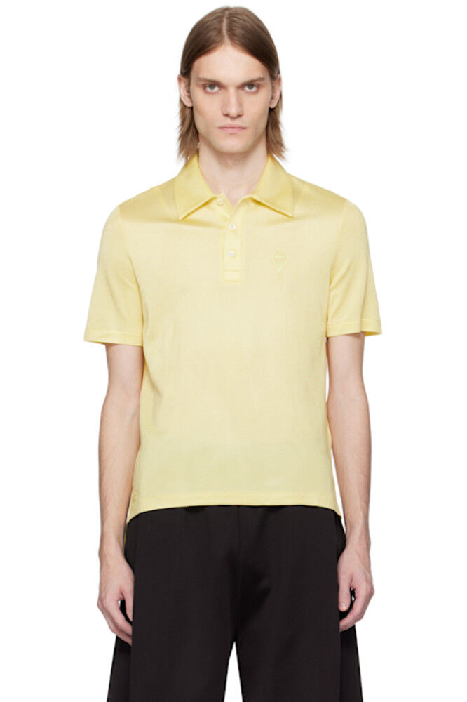 Желтый подиумный поло стандартного кроя из атласного пике Lacoste
Желтый подиумный поло стандартного кроя из атласного пике Lacoste