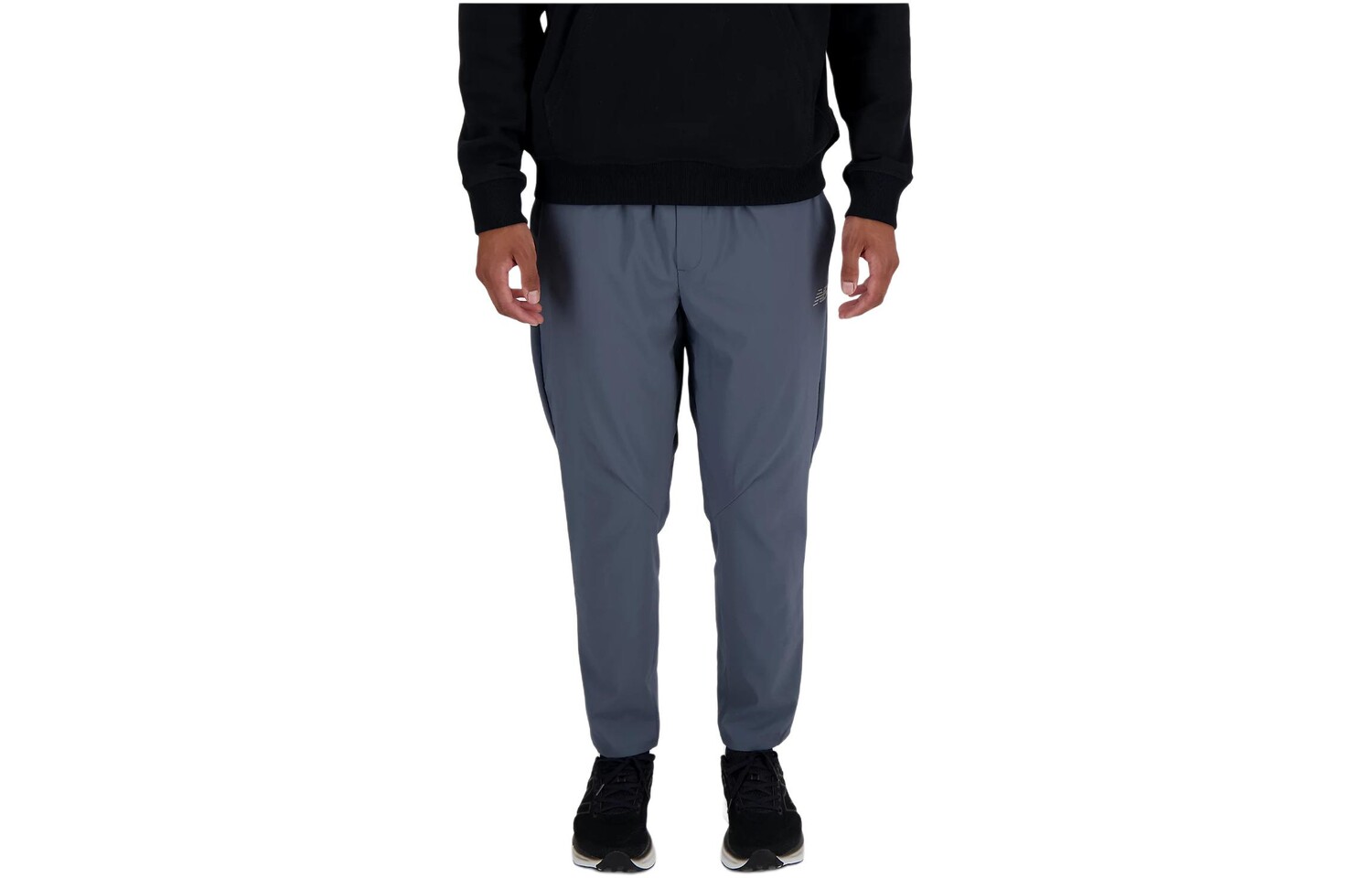 Повседневные брюки мужские графитового цвета New Balance, цвет Graphite
Повседневные брюки мужские графитового цвета New Balance, цвет Graphite