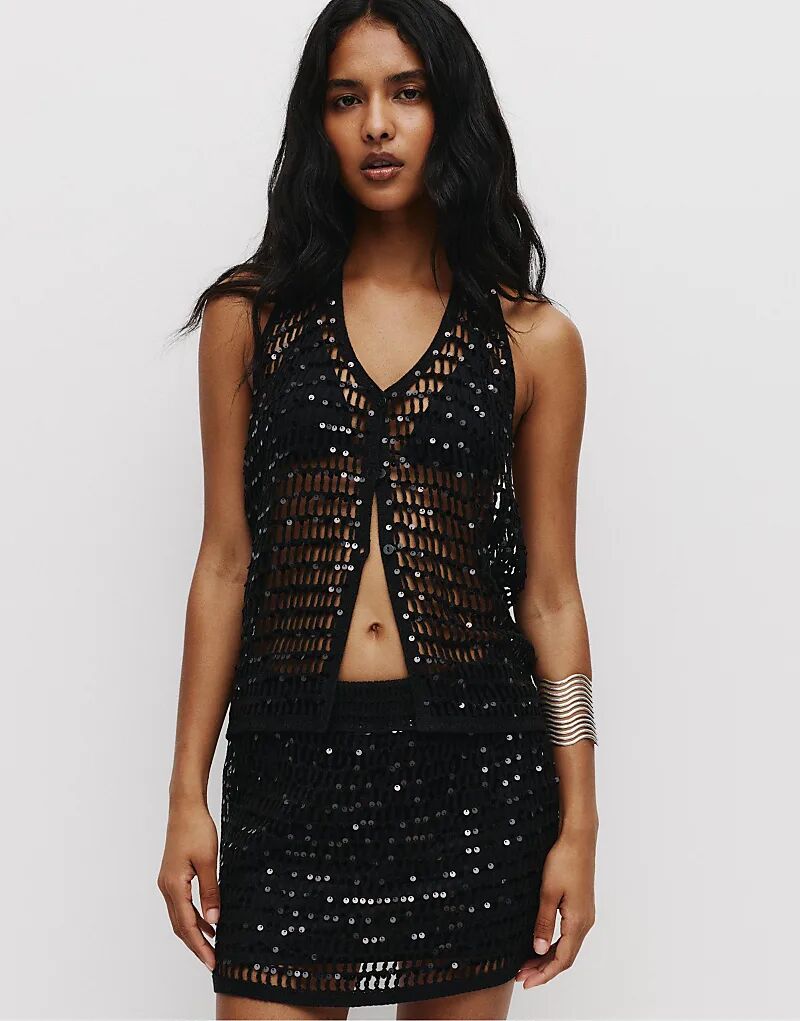 Вязаный топ-халтер Pull&Bear с пайетками черного цвета
Вязаный топ-халтер Pull&Bear с пайетками черного цвета