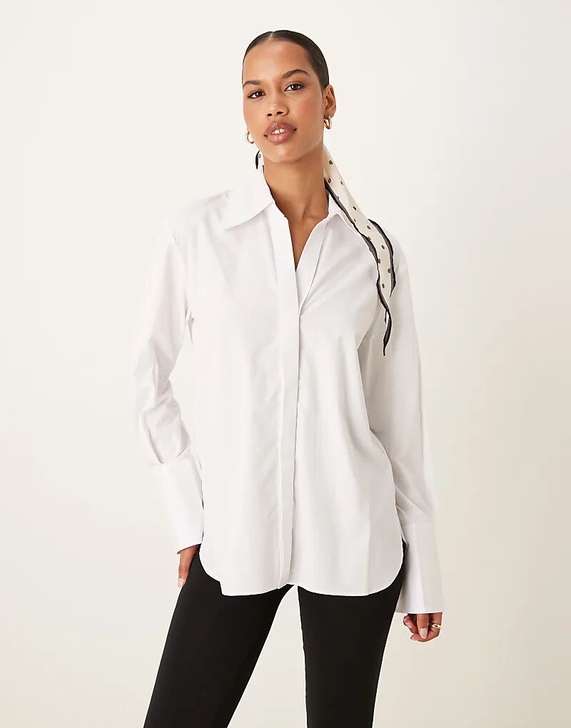 Рубашка Mango с длинными рукавами и закругленным подолом белого цвета
Рубашка Mango с длинными рукавами и закругленным подолом белого цвета