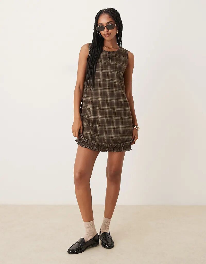Коричневое мини-платье с принтом в клетку Neon Rose
Коричневое мини-платье с принтом в клетку Neon Rose