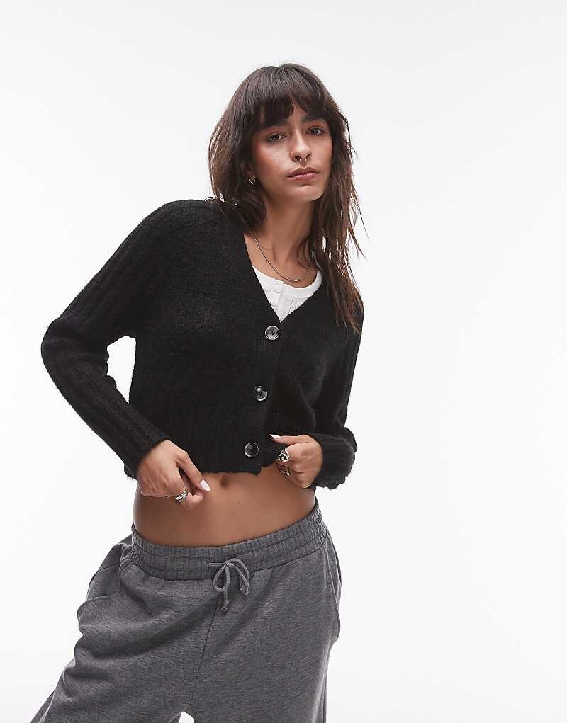 Черный свободный кардиган в рубчик с V-образным вырезом Topshop
Черный свободный кардиган в рубчик с V-образным вырезом Topshop