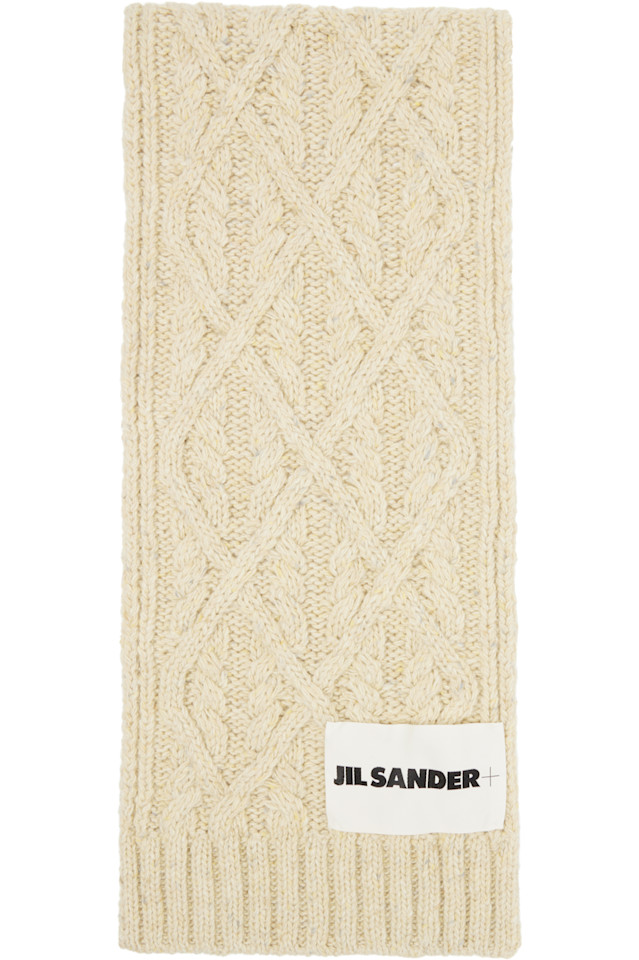 Jil Sander Бежевый толстый шерстяной шарф с косами из донегальского волокна
Jil Sander Бежевый толстый шерстяной шарф с косами из донегальского волокна