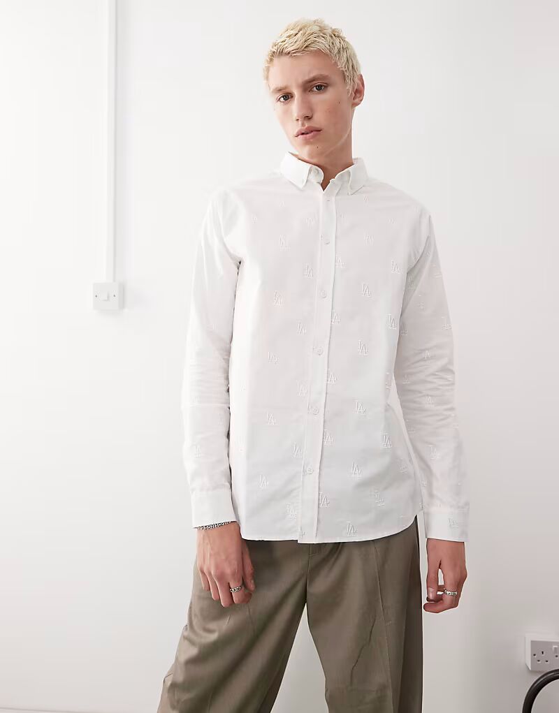 Футболка New Era NY Yankees с вышитым мини-логотипом и длинными рукавами кремового цвета
Футболка New Era NY Yankees с вышитым мини-логотипом и длинными рукавами кремового цвета