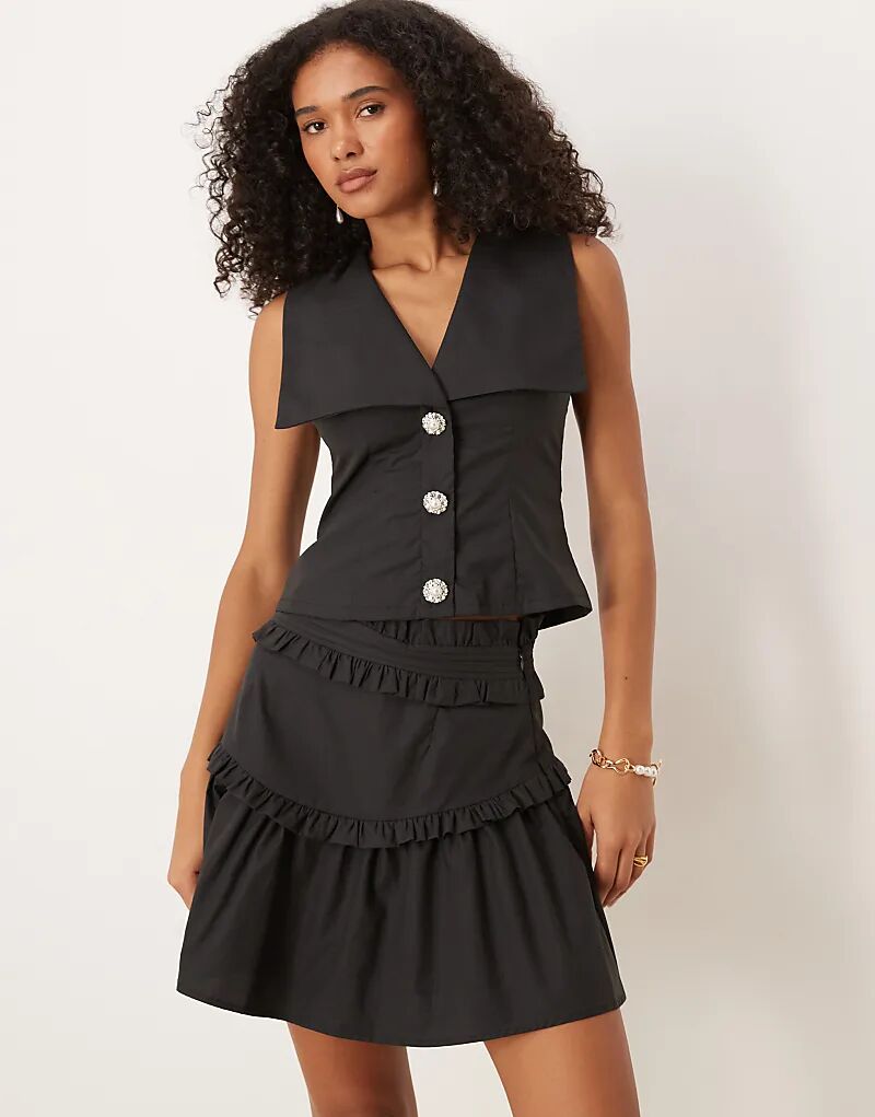 Мини-юбка от Sister Jane с оборками, черного цвета
Мини-юбка от Sister Jane с оборками, черного цвета