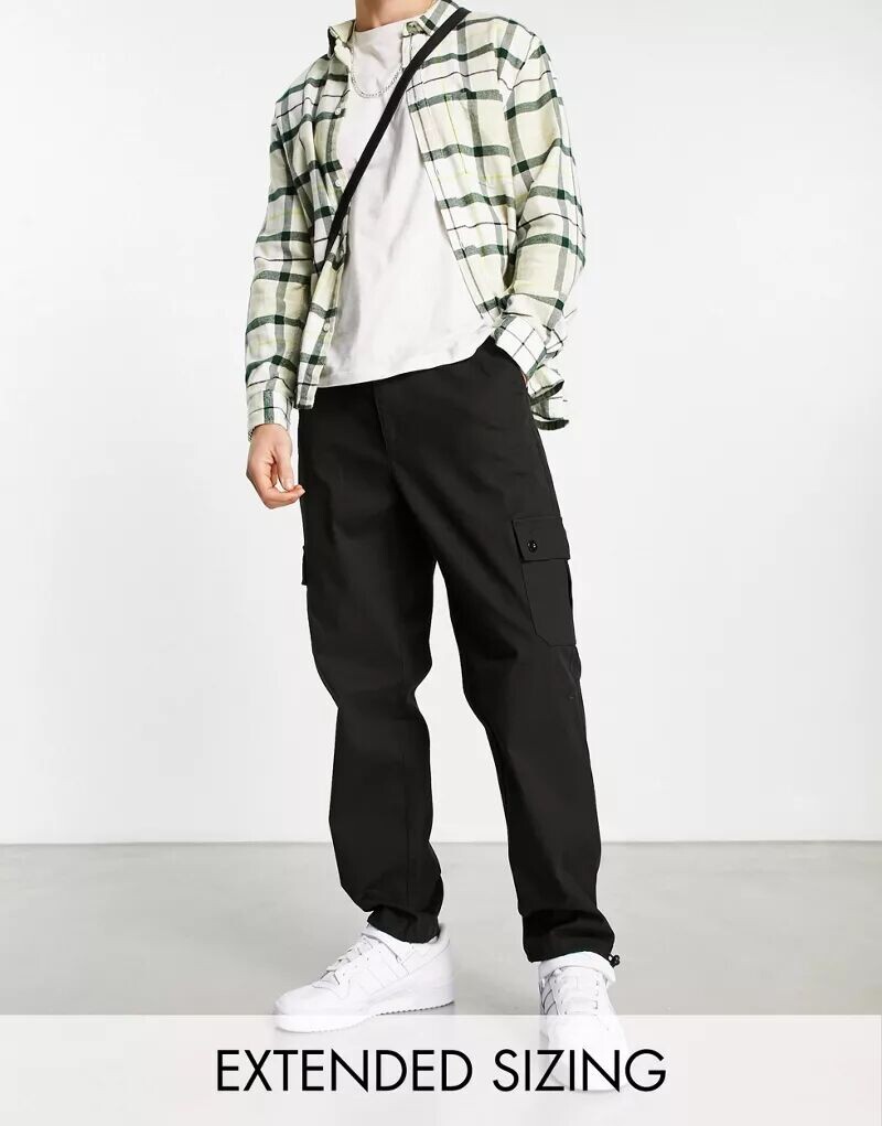 Черные зауженные брюки карго с застежками на пуговицы ASOS
Черные зауженные брюки карго с застежками на пуговицы ASOS