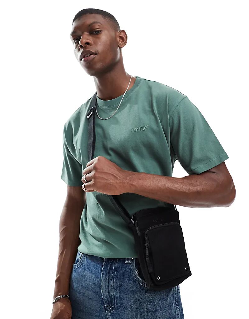 Маленькая холщовая сумка через плечо Levi's с тональным логотипом черного цвета
Маленькая холщовая сумка через плечо Levi's с тональным логотипом черного цвета
