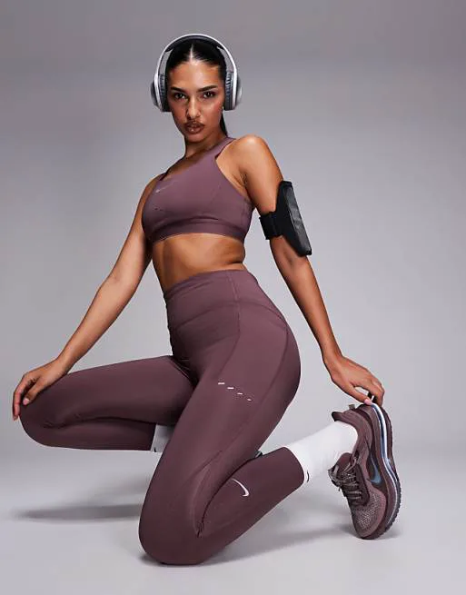 Темно-фиолетовые леггинсы Nike Running Swift Dri-FIT 7/8
Темно-фиолетовые леггинсы Nike Running Swift Dri-FIT 7/8
