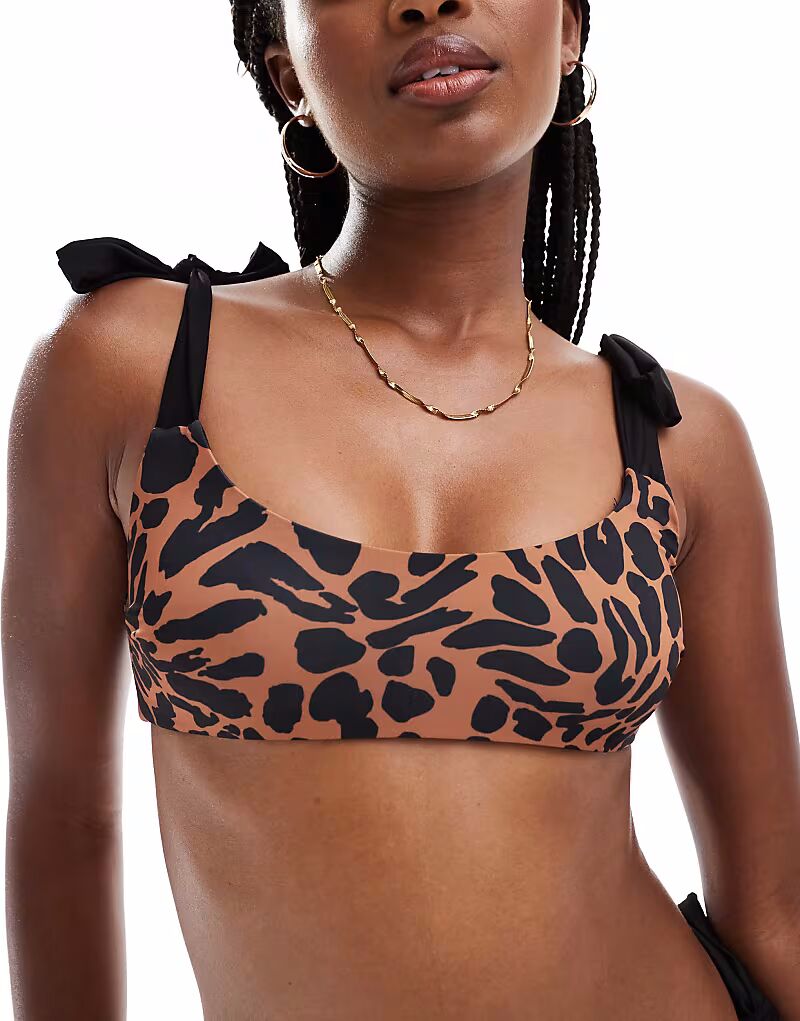 Укороченный бикини-топ Adrienne от ASOS DESIGN с завязками и крупным изображением животного
Укороченный бикини-топ Adrienne от ASOS DESIGN с завязками и крупным изображением животного
