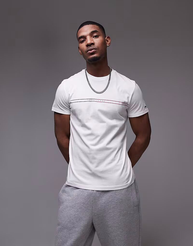 Футболка Tommy Jeans с линейным графическим принтом белого цвета
Футболка Tommy Jeans с линейным графическим принтом белого цвета