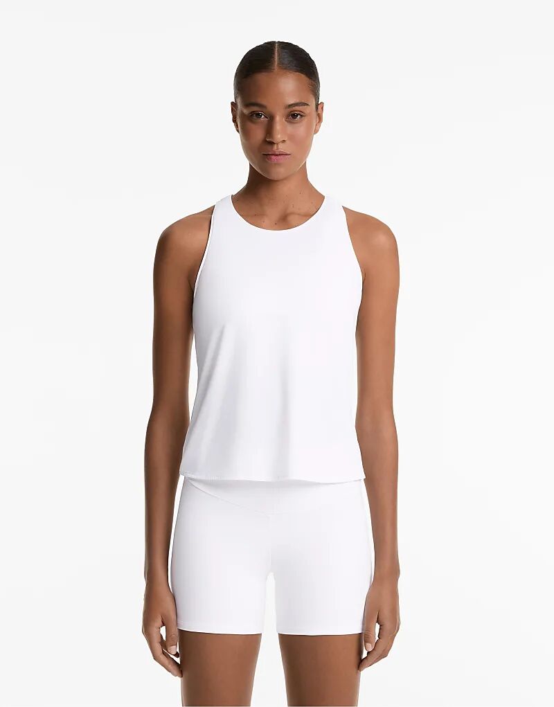 Футболка Comfortlux с перекрестной спинкой Oysho белого цвета
Футболка Comfortlux с перекрестной спинкой Oysho белого цвета