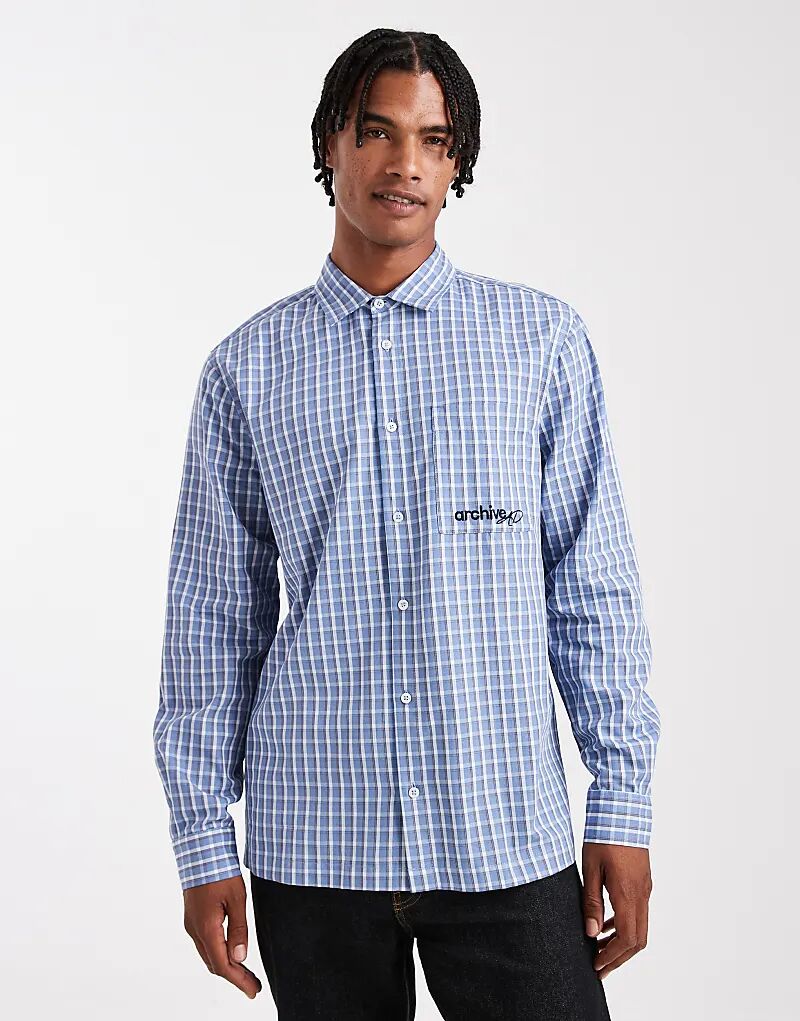 Рубашка ASOS DESIGN классического кроя в клетку с вышивкой на груди синего цвета
Рубашка ASOS DESIGN классического кроя в клетку с вышивкой на груди синего цвета