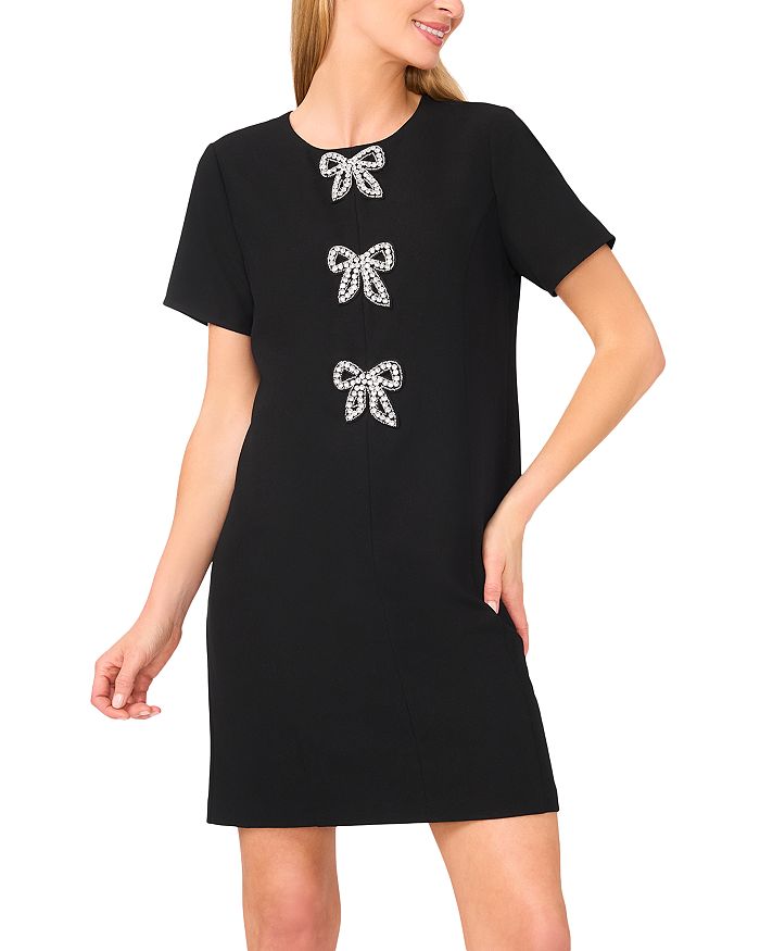 Платье-футляр с бантом и пайетками CeCe, черный
Платье-футляр с бантом и пайетками CeCe, черный