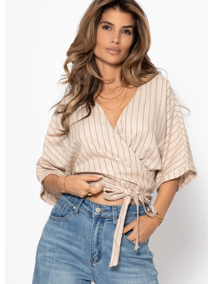 Блузка-халат из муслиновой ткани в полоску бежевого цвета SASSYCLASSY
Блузка-халат из муслиновой ткани в полоску бежевого цвета SASSYCLASSY