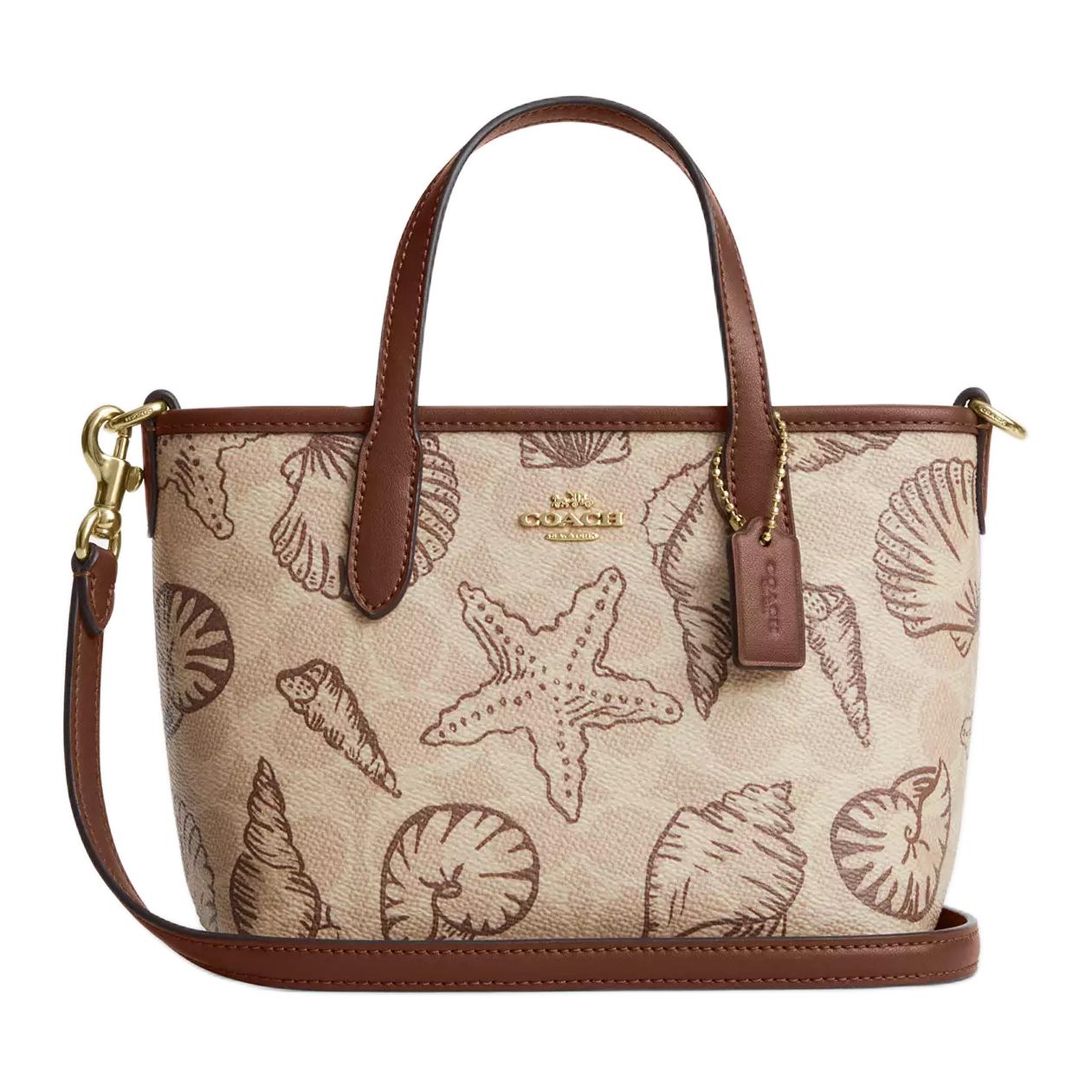 COACH Городская сумка тоут из прорезиненного хлопка
COACH Городская сумка тоут из прорезиненного хлопка