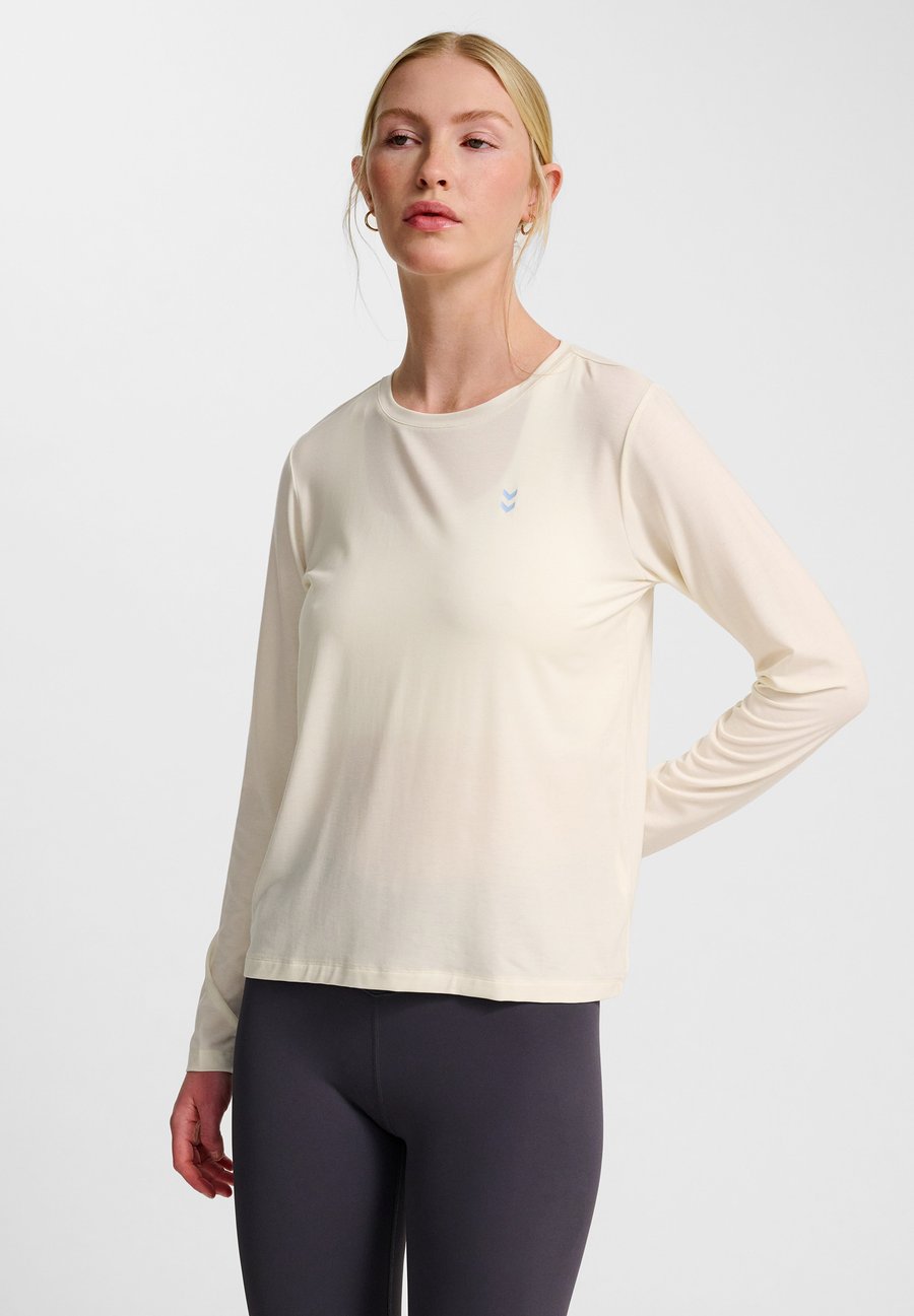 Топ Hummel YOGA SOFT, Tofu/Off-White
Топ Hummel YOGA SOFT, Tofu/Off-White