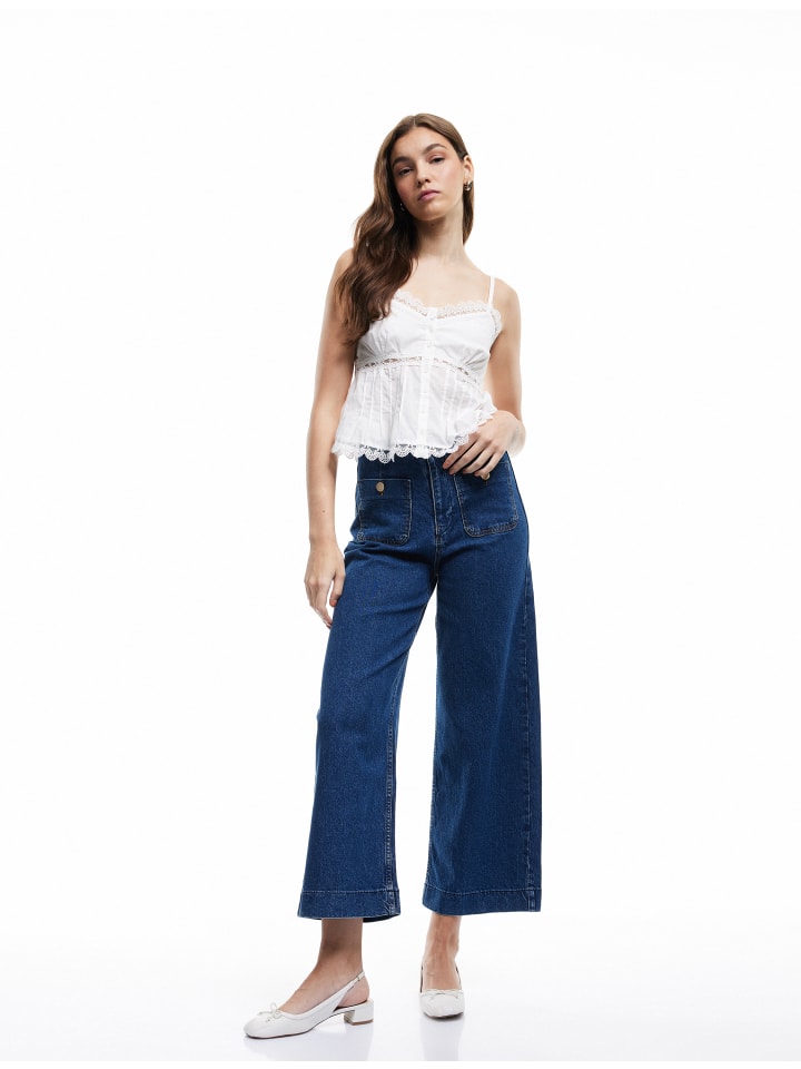 Брюки цвета индиго среднего размера KOTON
Брюки цвета индиго среднего размера KOTON