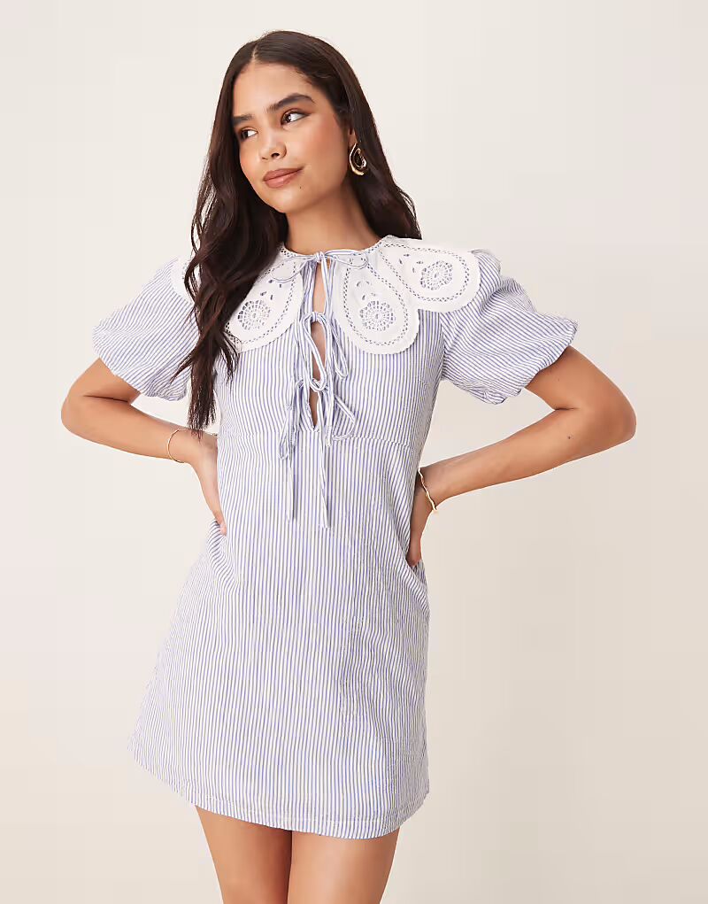 Платье-рубашка мини-юбка Bessie от Nobody's Child с фестончатым воротником в тонкую синюю полоску
Платье-рубашка мини-юбка Bessie от Nobody's Child с фестончатым воротником в тонкую синюю полоску