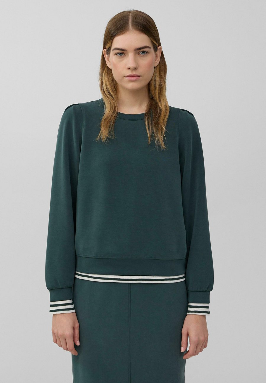 Толстовка s.Oliver MIT PUFFÄRMELN, Tannengrün/Teal
Толстовка s.Oliver MIT PUFFÄRMELN, Tannengrün/Teal