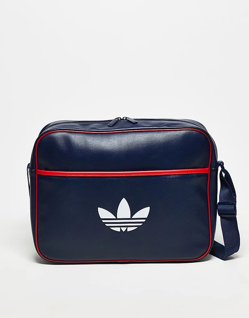 Сумка-авиаплан adidas Originals синего цвета
Сумка-авиаплан adidas Originals синего цвета