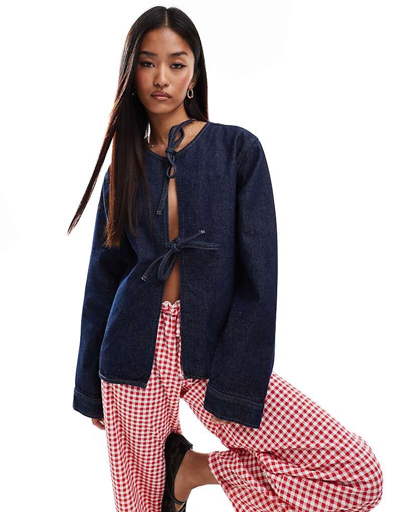 ASOS DESIGN – джинсовый топ цвета индиго с завязками спереди и длинными рукавами
ASOS DESIGN – джинсовый топ цвета индиго с завязками спереди и длинными рукавами