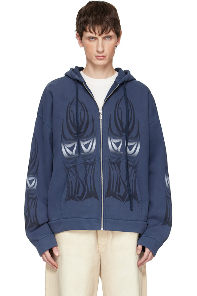 Who Decides War Толстовка на молнии с синими крыльями
Who Decides War Толстовка на молнии с синими крыльями