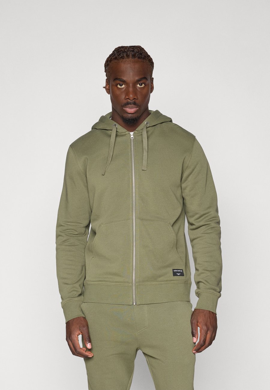 Толстовка Björn Borg CENTRE ZIP HOODIE, Dusty Olive/Olive
Толстовка Björn Borg CENTRE ZIP HOODIE, Dusty Olive/Olive
