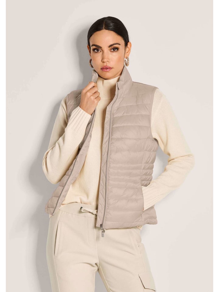MADELEINE Укороченный стеганый жилет для женщин бежевого цвета
MADELEINE Укороченный стеганый жилет для женщин бежевого цвета
