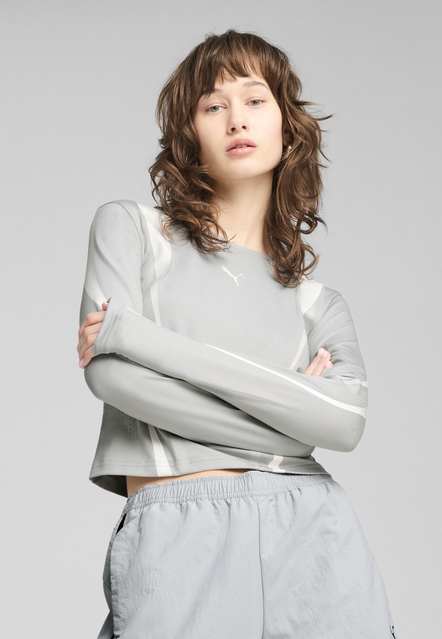 Топ Puma DARE TO GRAPHIC, Flat Light Gray/Grey
Топ Puma DARE TO GRAPHIC, Flat Light Gray/Grey