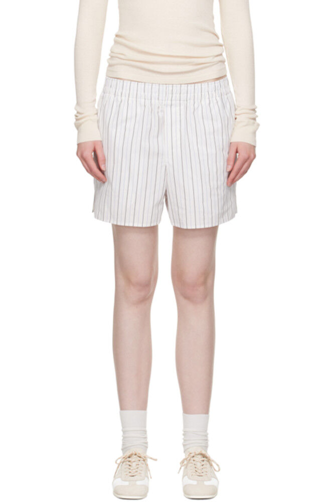 Белые хлопковые эластичные шорты AMI Paris
Белые хлопковые эластичные шорты AMI Paris