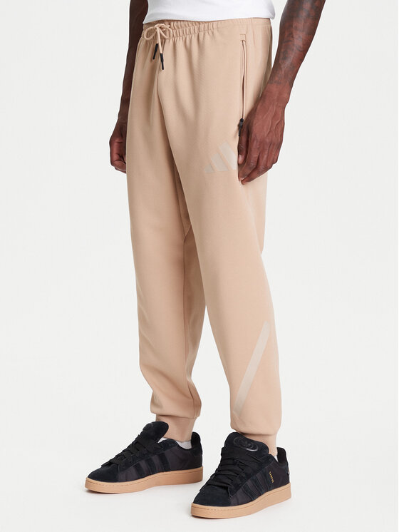 Свободные спортивные штаны Z.N.E. JW4725 Adidas, бежевый
Свободные спортивные штаны Z.N.E. JW4725 Adidas, бежевый