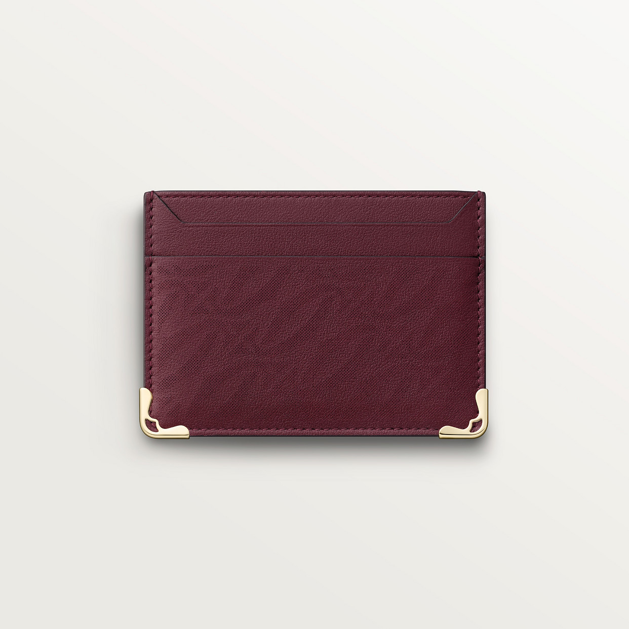 Картхолдер Cartier Porte-cartes double, Must de Cartier, телячья кожа бордового цвета с перфорированным логотипом
Картхолдер Cartier Porte-cartes double, Must de Cartier, телячья кожа бордового цвета с перфорированным логотипом