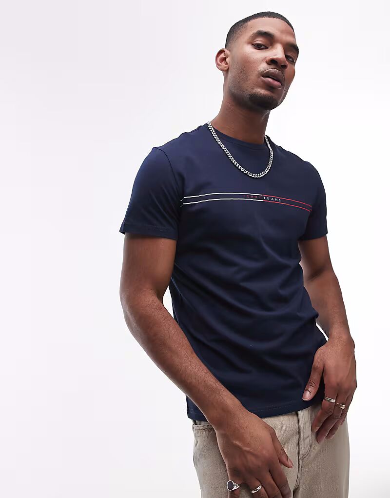 Футболка Tommy Jeans с линейным графическим принтом темно-синего цвета
Футболка Tommy Jeans с линейным графическим принтом темно-синего цвета