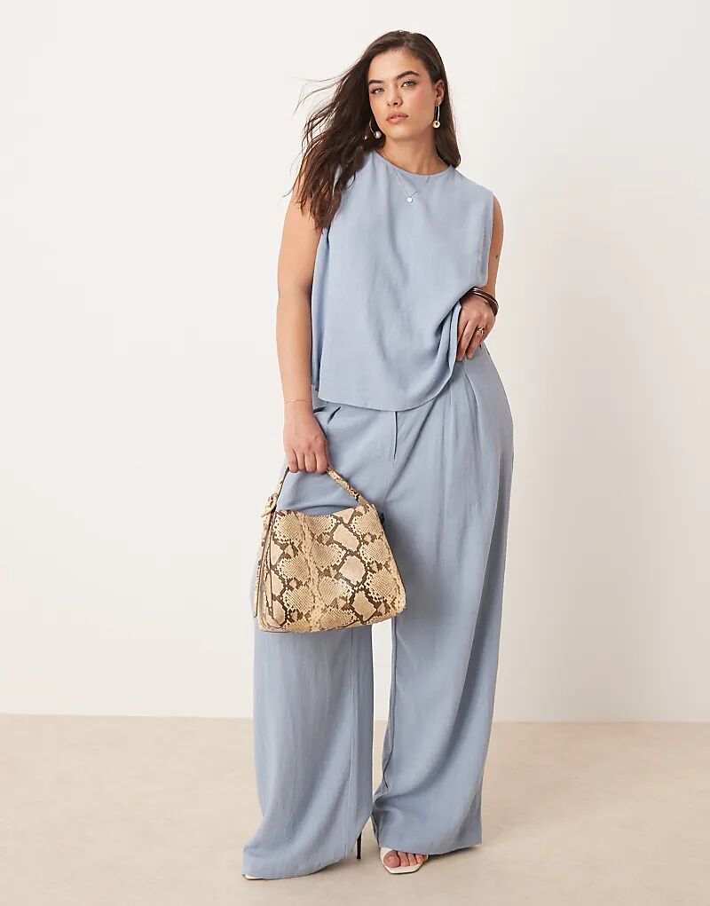 Широкие брюки ASOS DESIGN Curve со складками спереди и льняным комбинезоном синего цвета
Широкие брюки ASOS DESIGN Curve со складками спереди и льняным комбинезоном синего цвета