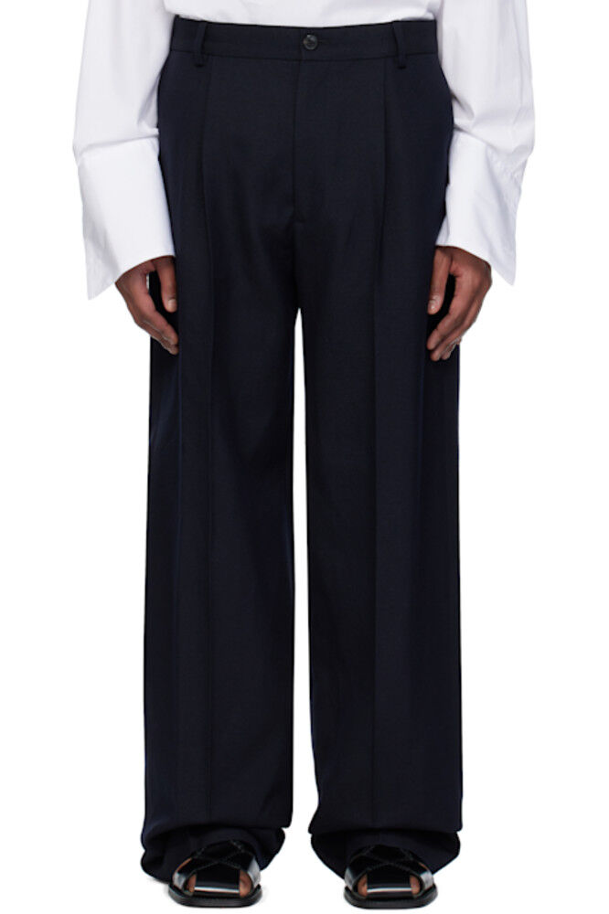 Брюки из темно-синей шерстяной саржи Dries Van Noten
Брюки из темно-синей шерстяной саржи Dries Van Noten