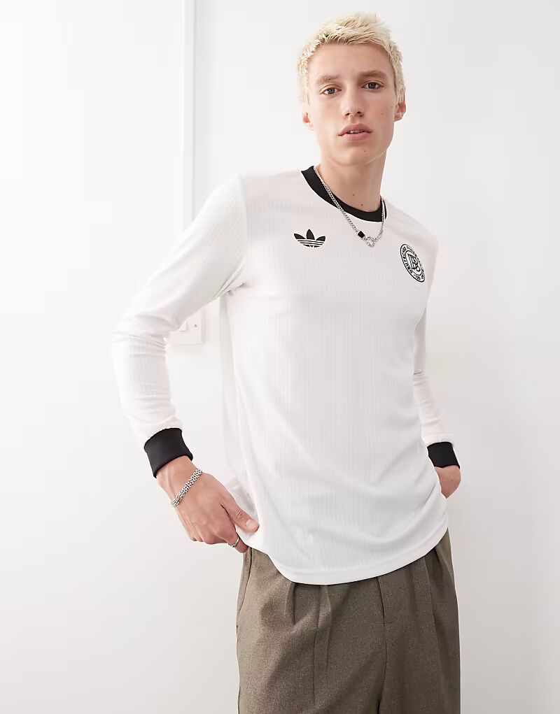 Футболка с длинным рукавом Adidas Football Germany в честь юбилея в белом и черном цветах Adidas Performance
Футболка с длинным рукавом Adidas Football Germany в честь юбилея в белом и черном цветах Adidas Performance