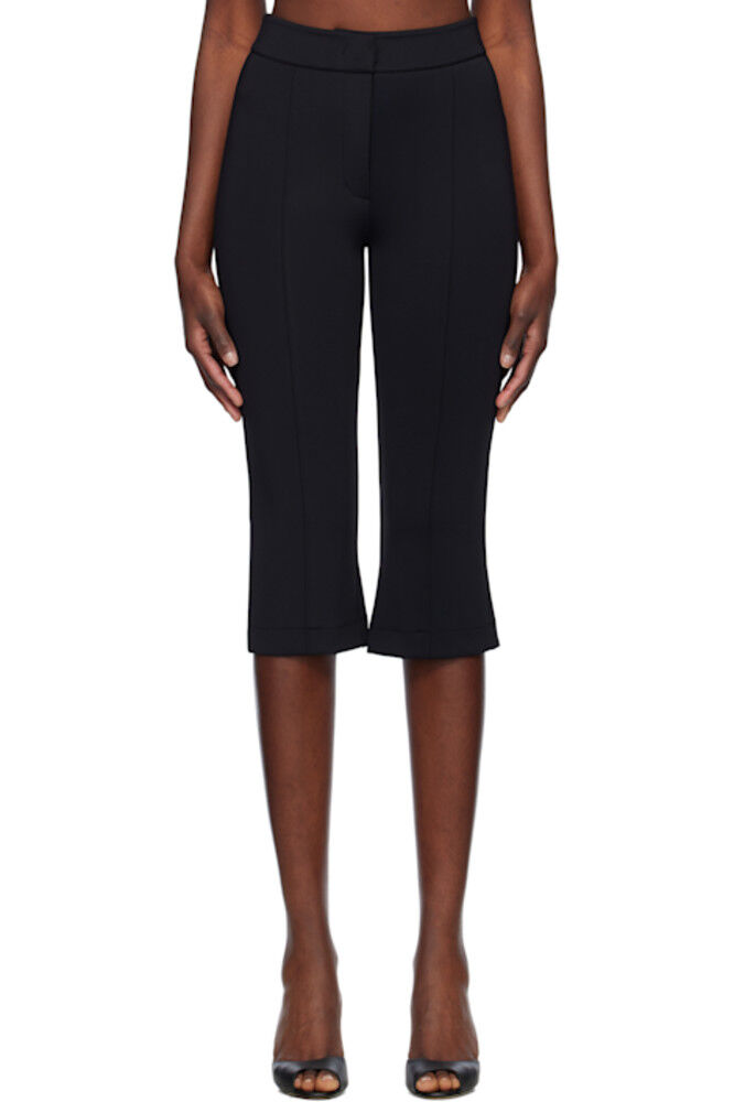 Черные эластичные облегающие брюки длины миди RECTO
Черные эластичные облегающие брюки длины миди RECTO