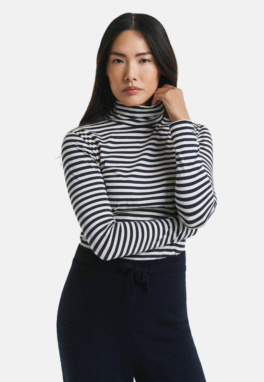 Топ GANT STRIPED TURTLENECK, Evening Blue/Blue
Топ GANT STRIPED TURTLENECK, Evening Blue/Blue