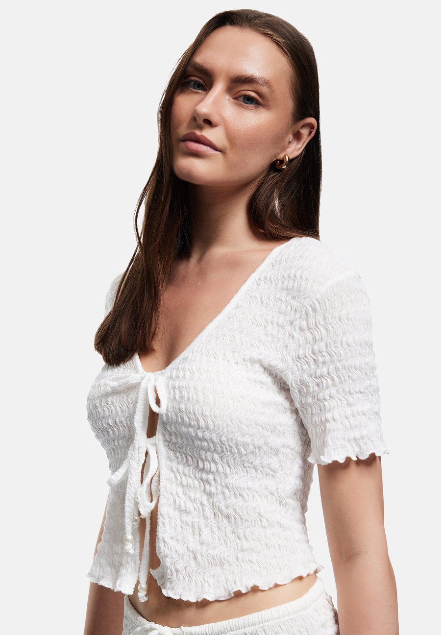 Блуза Koton TEXTURED CROP, Off-White
Блуза Koton TEXTURED CROP, Off-White