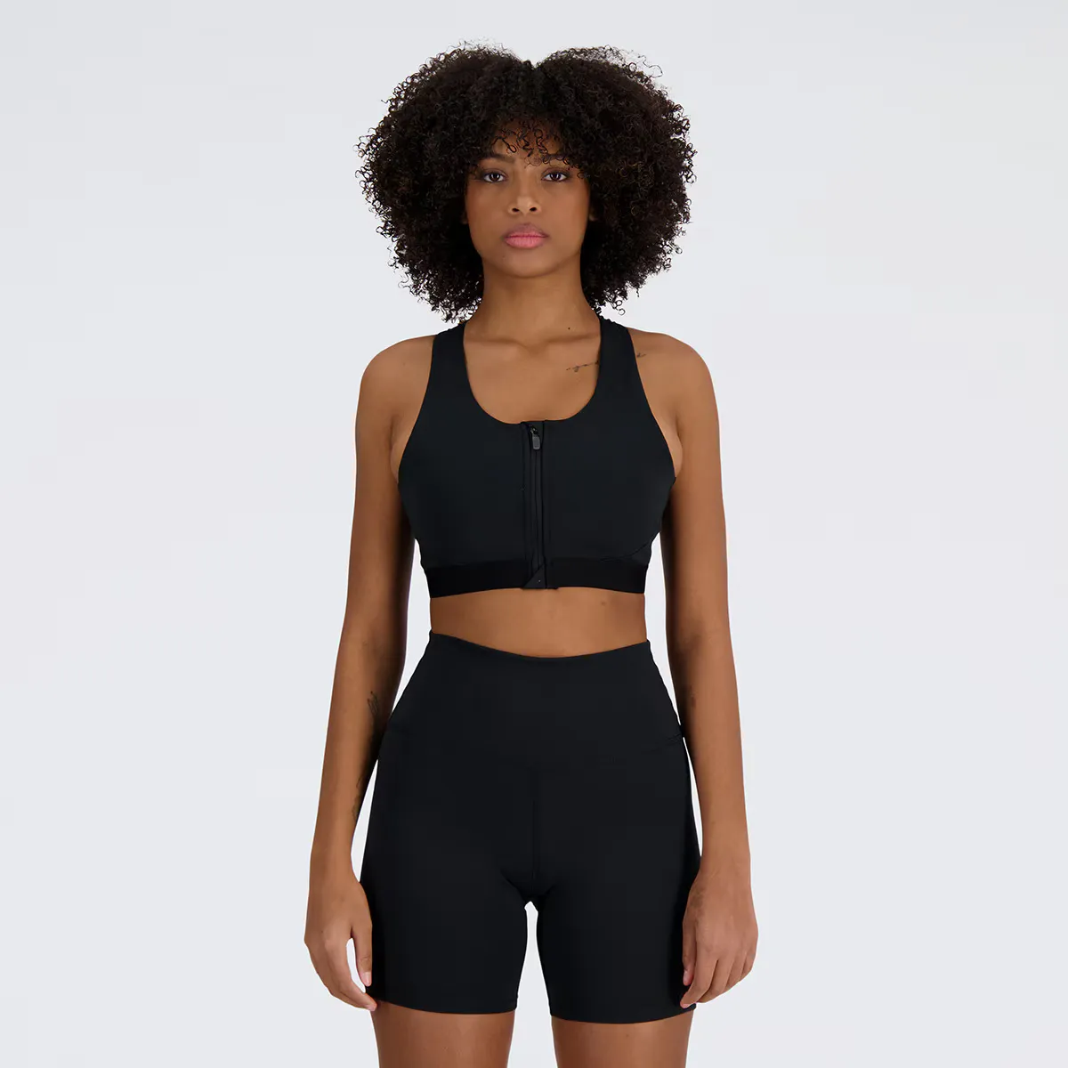 NB Athletics Женский топ со средней поддержкой Гладкая молния спереди Sports New Balance, чёрный
NB Athletics Женский топ со средней поддержкой Гладкая молния спереди Sports New Balance, чёрный