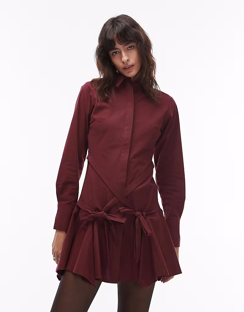 Платье-рубашка мини с завязкой на талии ягодного цвета Asos Design
Платье-рубашка мини с завязкой на талии ягодного цвета Asos Design