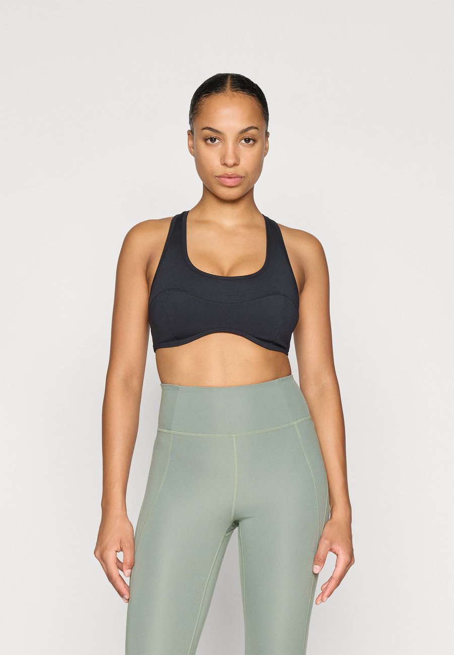 Бюстгальтер Girlfriend Collective CONNIE CURVED BRA, Black
Бюстгальтер Girlfriend Collective CONNIE CURVED BRA, Black